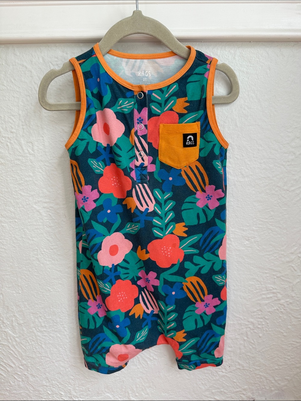 Rags Floral Sleeveless Romper in Teal with Orange Trim